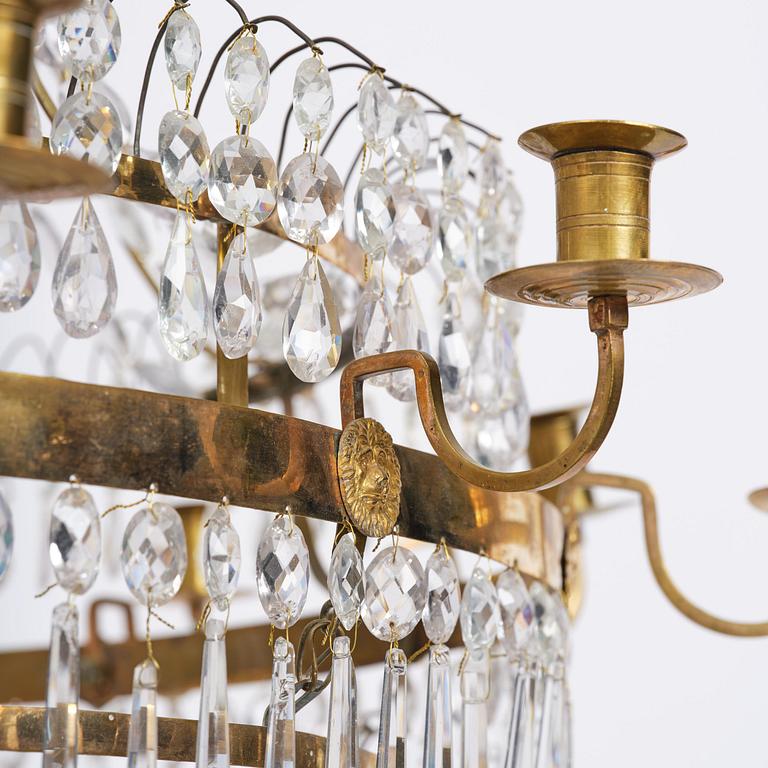 A late Gustavian thirteen-light gilt brass and cut glass chandelier, Stockholm, late 18th century.