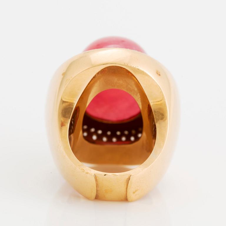 An 18K gold and rhodochrosite Acchinelli ring set with round brilliant-cut diamonds.