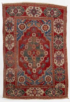 An oriental rug, c. 190 x 130 cm.
