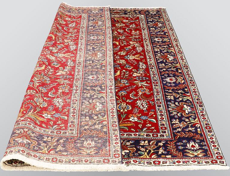 A carpet, Figural Tabriz, ca 310 x 220 cm.