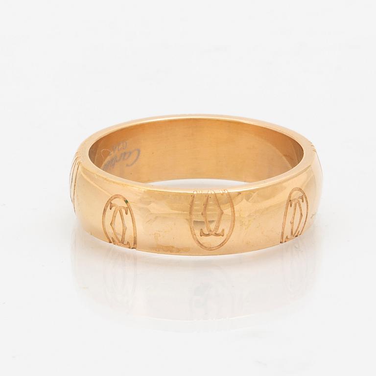 An 18K gold ring "Logo de Cartier" by Cartier.