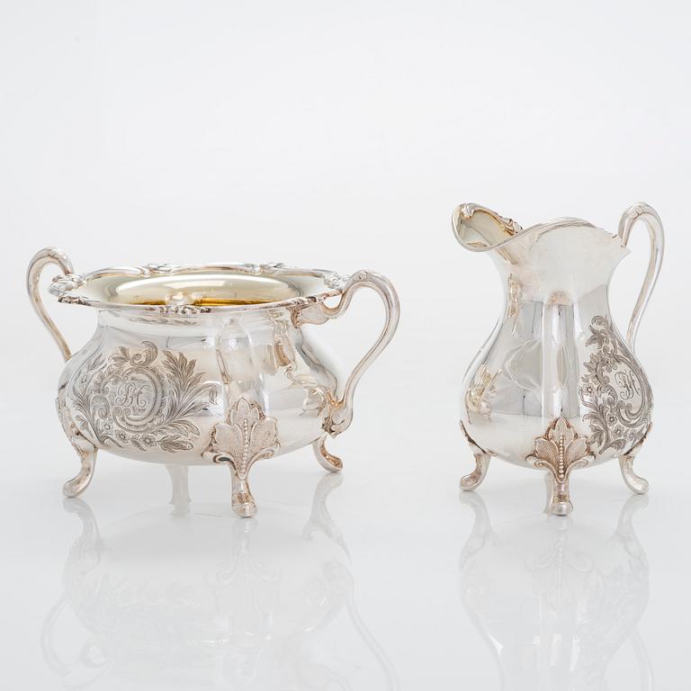 A silver sugar bowl, cream jug and footed serving bowl, and six coasters, Turku and Hämeenlinna 1934-56.