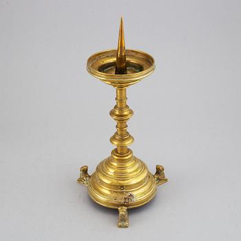 A 19th century bronze candlestick.