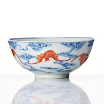 A Chinese iron-red-decorated blue and white Wufu bat bowl, late Qing dynasty, around 1900.