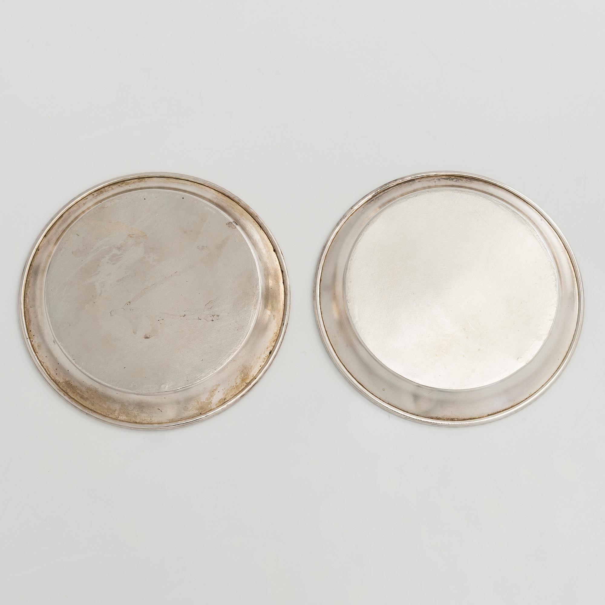 A 12-piece set of silver glass coasters, Kultakeskus, Hämeenlinna 1952. In original fitted case.