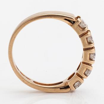 A 14K gold ring set with brilliant-cut diamonds approx. 0.75 ct in total, 2009.