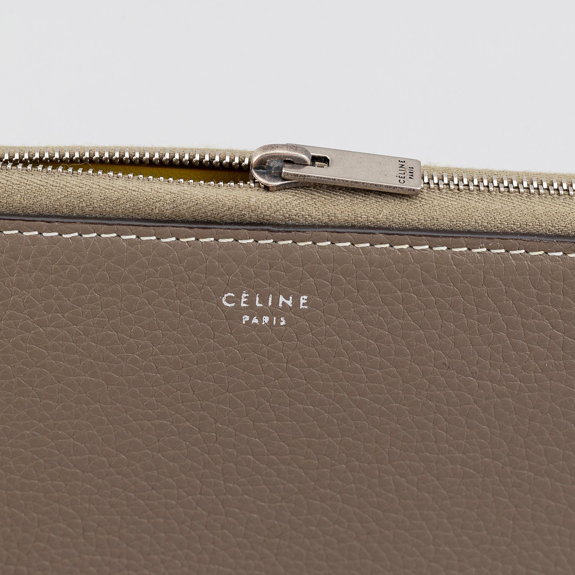 Céline, 'Souris Large Zipped Multifunction' wallet.