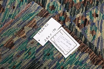 A Kilim rug, c. 250 x 194 cm.