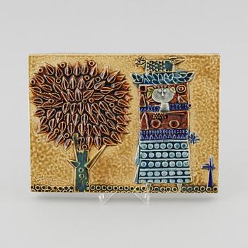 A stoneware wall plaque by Stig Lindberg, signed in the ceramics.