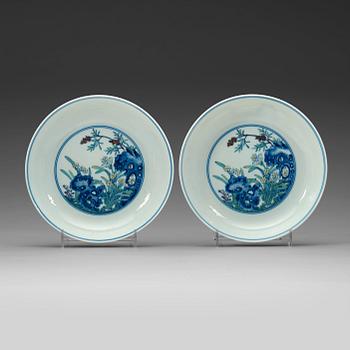 329. A pair of doucai dishes, 20th Century, with Yongzheng six charcter mark.