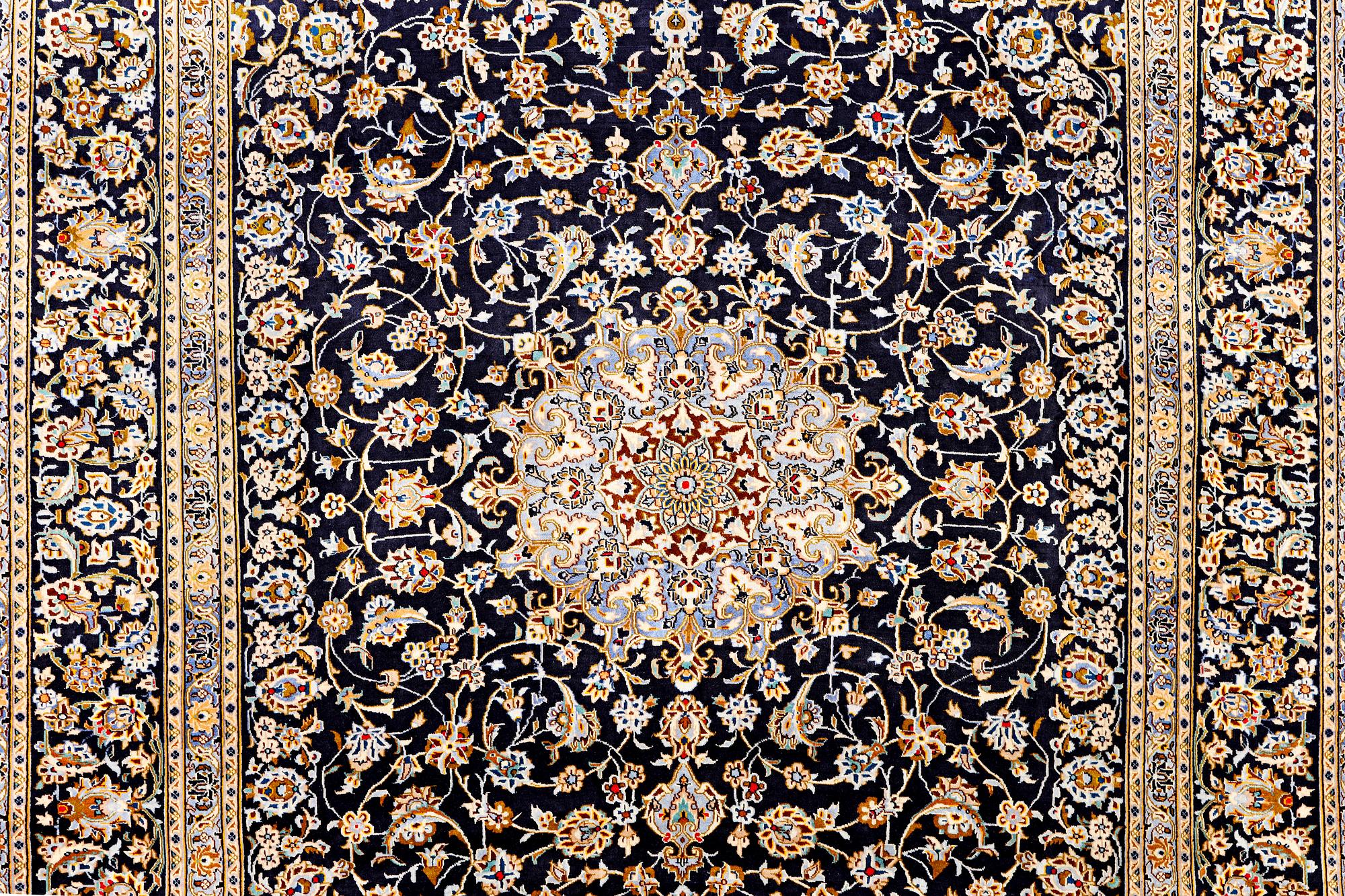 A Kashan carpet, c. 413 x 308 cm.