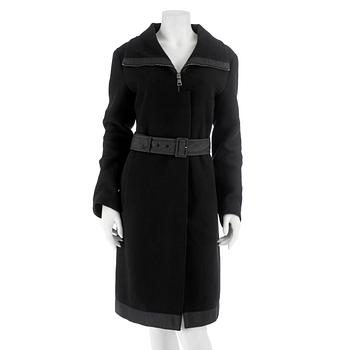 547. PRADA, a black wool coat, size 44.