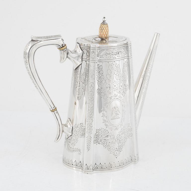 An English Silver Coffee Pot, Teapot, Creamer and Sugar Bowl, mark of Walker & Hall (John Edward Bingham) Sheffield 1891.