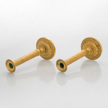 A pair of early 19th century French Empire candlesticks.