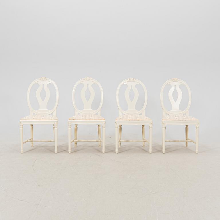 A late 20th century painted Gustavian style 5 pcs dining suit.