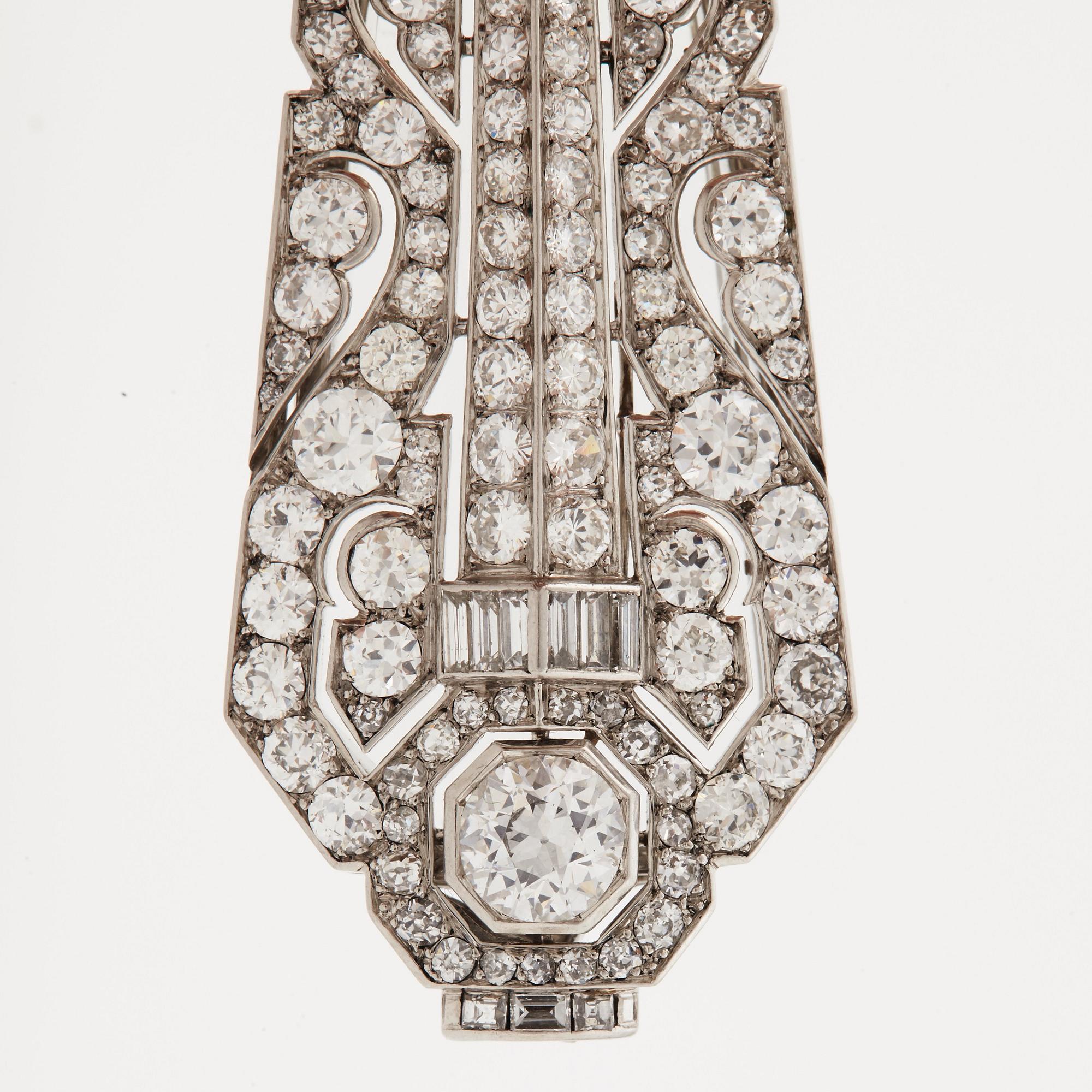 A pair of lorgnettes set with old- single- and baguette cut diamonds.