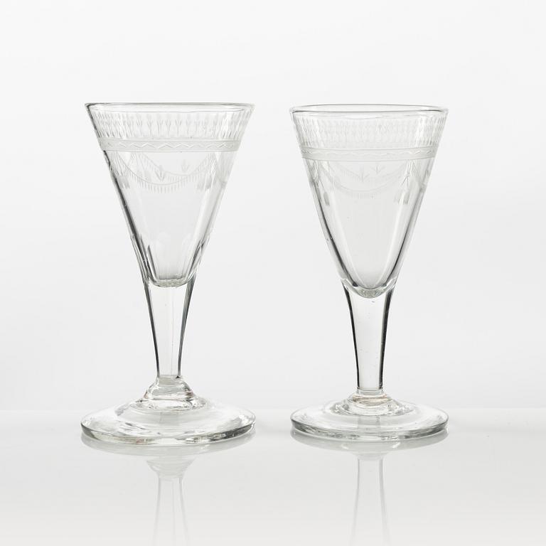 A set of six engraved glasses and one decanter, possibly Strömbäcks or Reijmyre, early 19th Century.