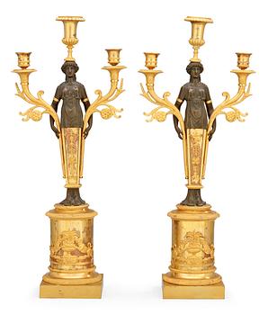 752. A pair of Swedish Empire early 19th century three-light candelabra.