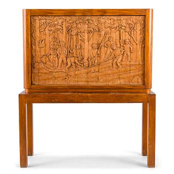 Margaret T. Nordman, A 1930s wooden writing cabinet, sculpted by Hannes Autere. Oy Stockmann Ab, Keravan Puusepäntehdas.
