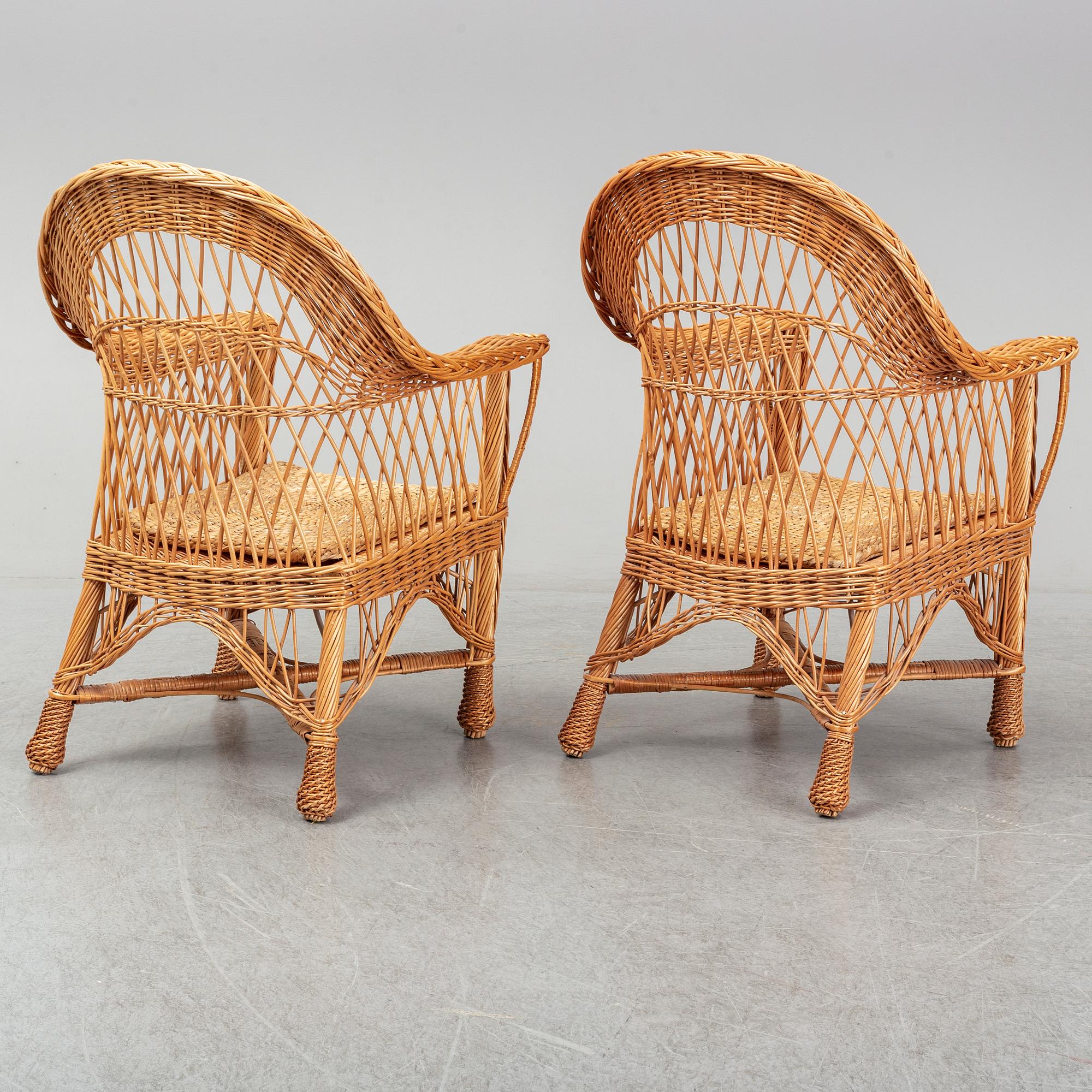 A pair of 1970s/1980s rattan armchairs.