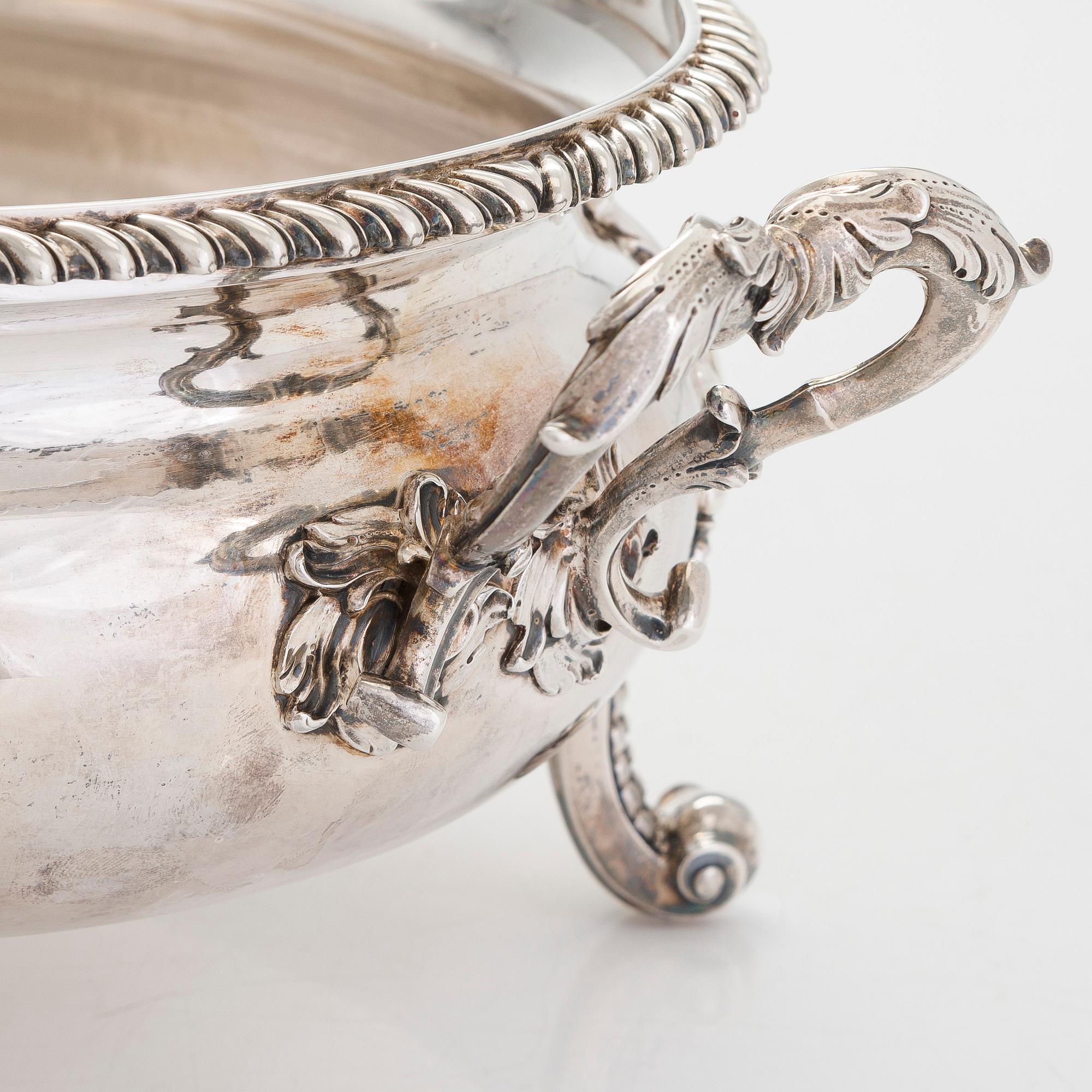 A mid-18th-century sterling silver tureen, mark of Peter Archambo II and Peter Meure, London 1753.