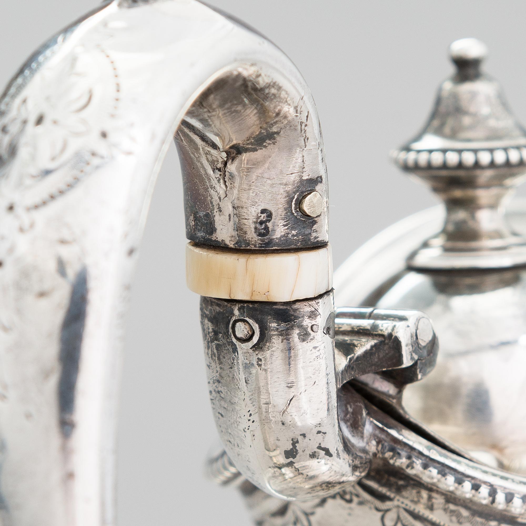 MARTIN, HALL & CO, A sterling silver pitcher, Sheffield 1873.