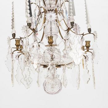 A six-light rococo-style chandelier, late 19th century incorporating older elements.