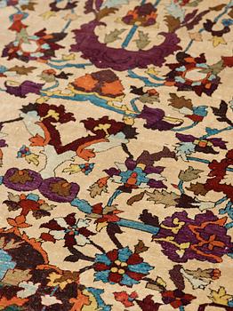 A RUG. An antique silk Kashan so called Motachem. 202,5 x 136,5 cm.