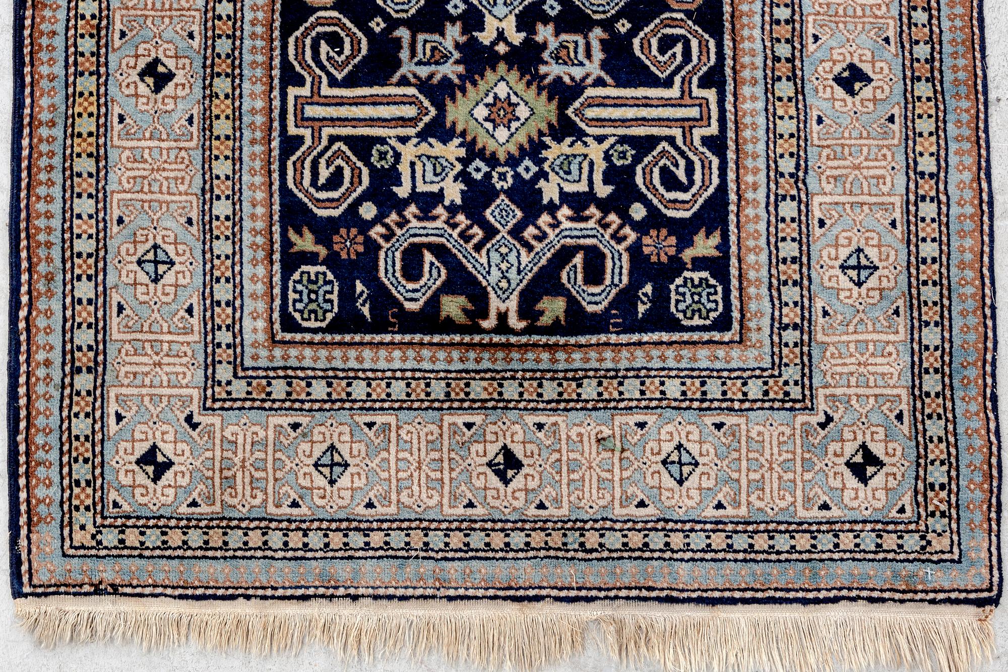 An old/seminatique Kuba carpet ca 134x83 cm.