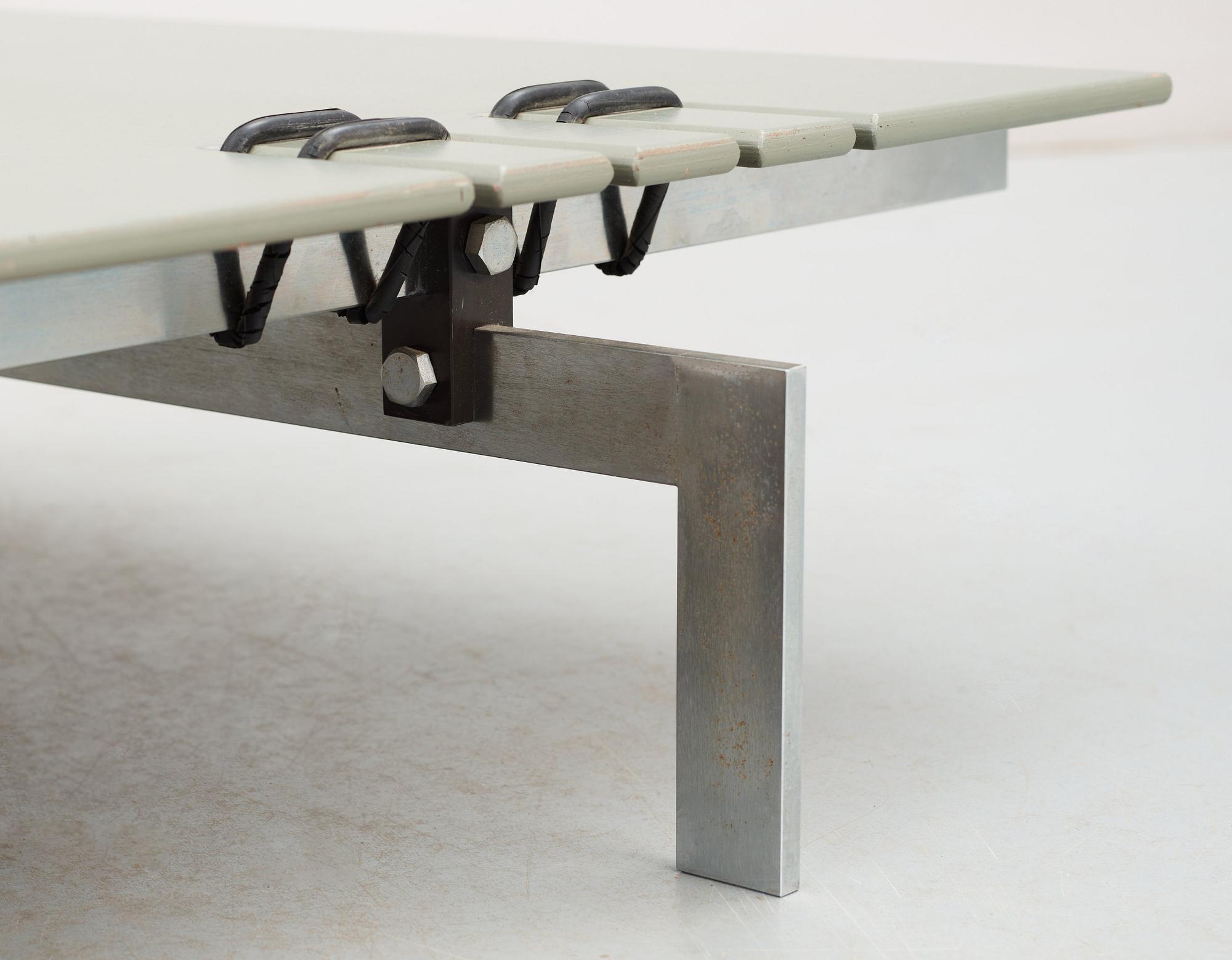 A Poul Kjaerholm 'Pk-80' brown leather aand steel daybed, Fritz Hansen, Denmark.