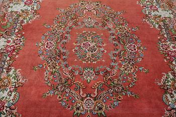 A Tabriz carpet, c. 410 x 199 cm.