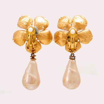 A pair of earrings by Yves Saint Laurent.