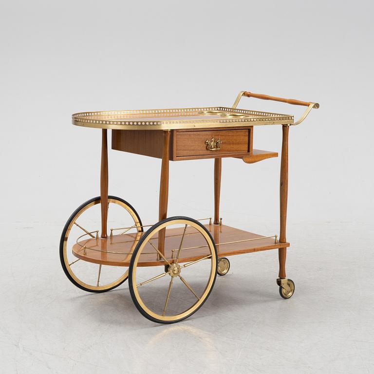 A mahogany-veneered serving trolley, mid 20th Century.
