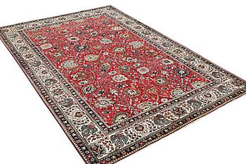 A carpet, Tabriz, ca 328 x 244 cm.