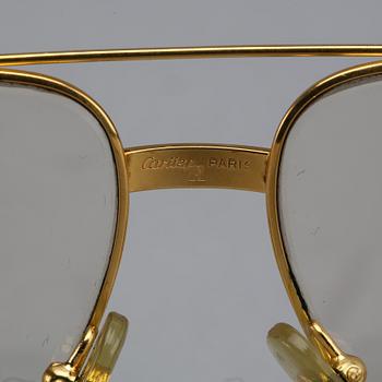 CARTIER, glasses.