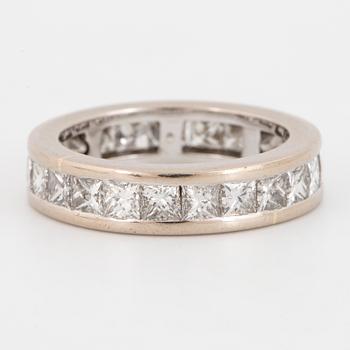 Princess-cut diamond eternity ring.