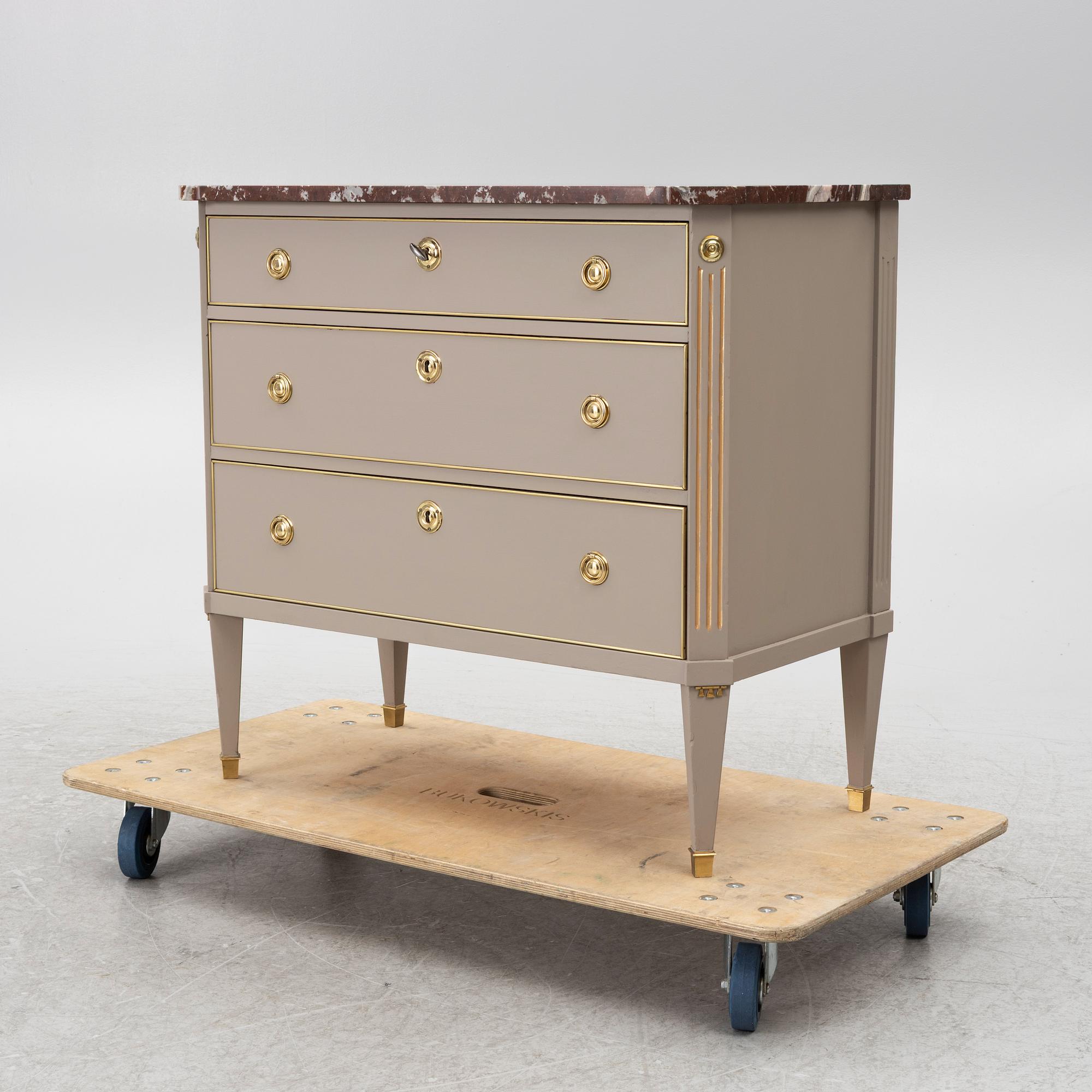 A Gustavian style chest of drawers, Mid 20th Century.