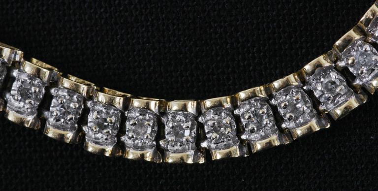 ARMBAND, 14 K guld samt briljanter, 11 g.