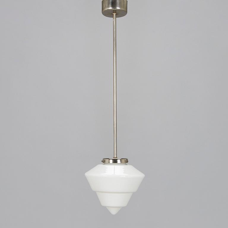 Paavo Tynell, kattovalaisin, malli 553 Taito 1930-luku.