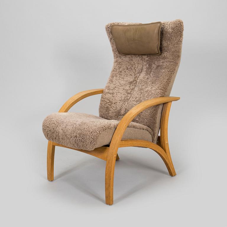 A 'Delta Adventure' armchair with ottoman, Brunstad, Norway.