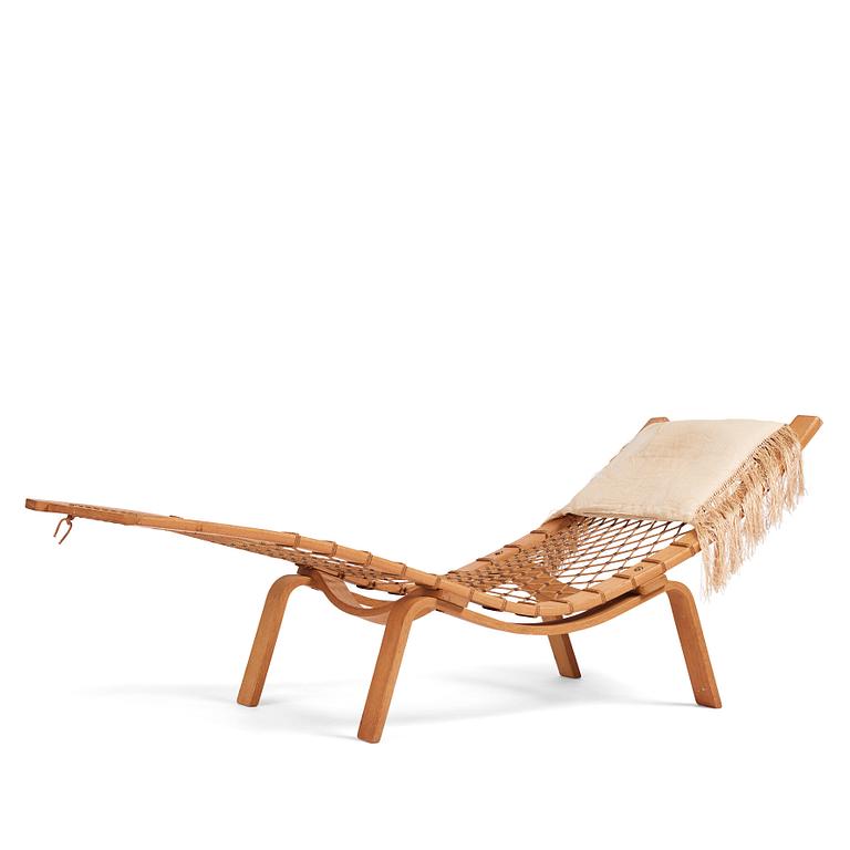 Hans J. Wegner, an oak chaise longue 'Hammock Chair GE2', Getama, Denmark, early 1960s.