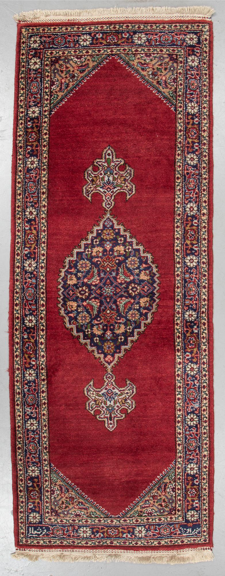 A runner, Tabriz probably, signed, ca 193 x 70 cm.