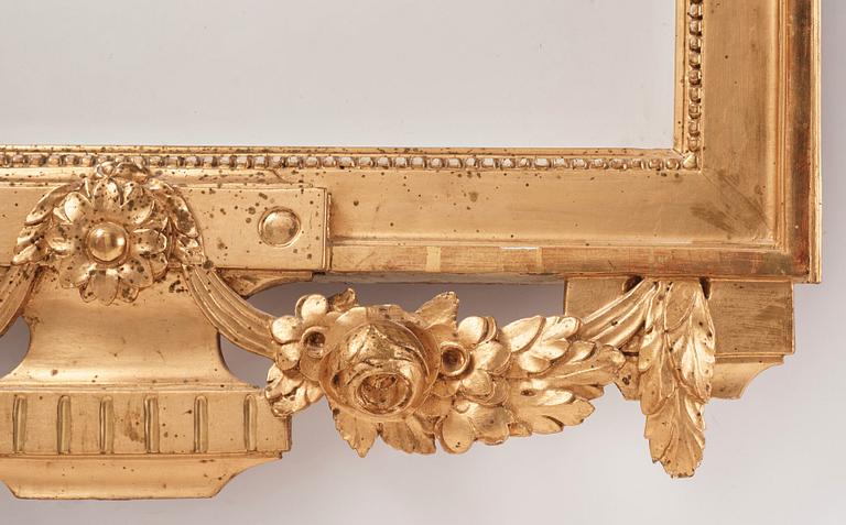 A Gustavian giltwood mirror, late 18th century.