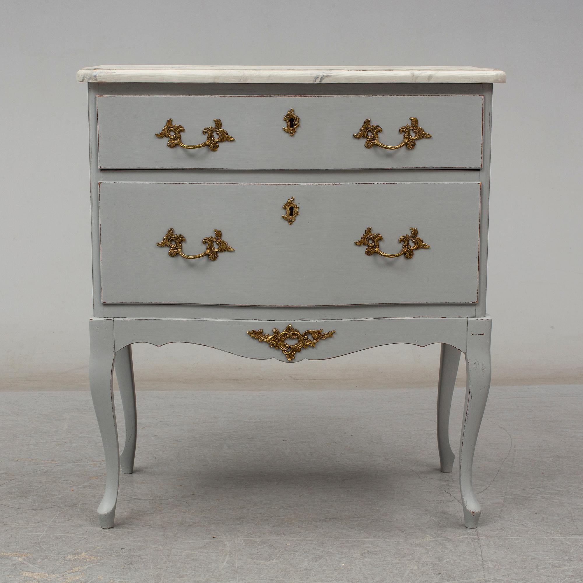 A Rococo style chest of drawers, second half of the 20th century.