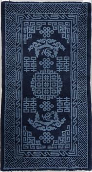 A wedding rug, a semi-antique Baotou, China, ca 110 x 60,5-62 cm.