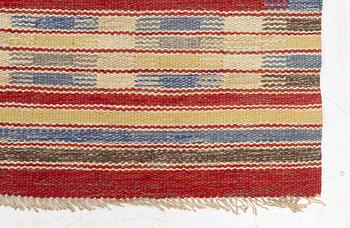 A flat weave carpet, c. 256 x 158 cm.