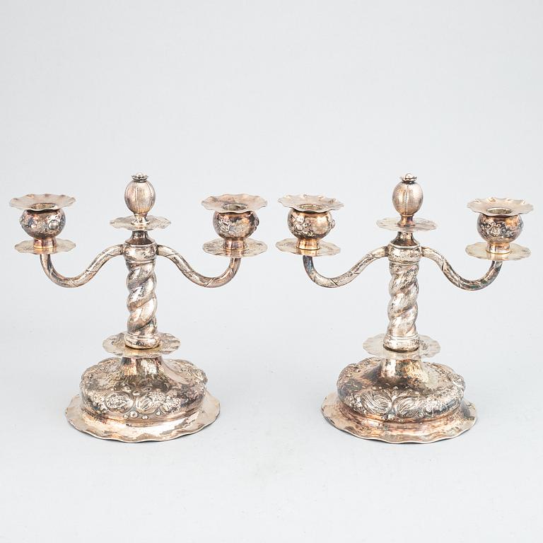 A pair of silver candelabra, CG Hallberg, Stockholm 1955.