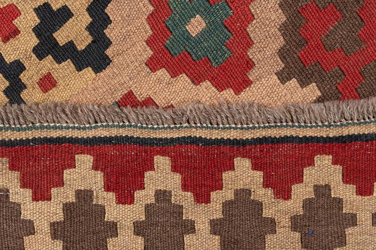 A carpet, a kilim, probably Veramin, ca 153 x 121,5 cm.