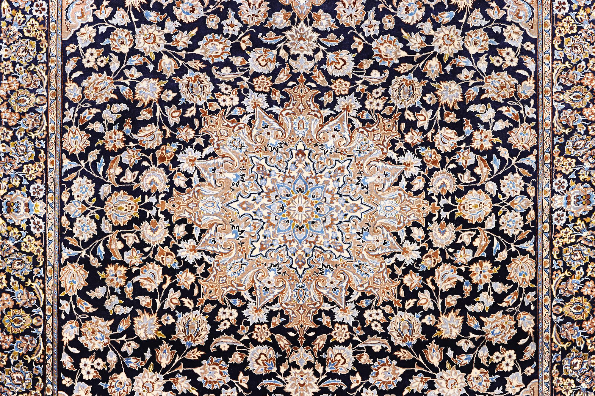 A Kashan carpet, c. 430 x 293 cm.