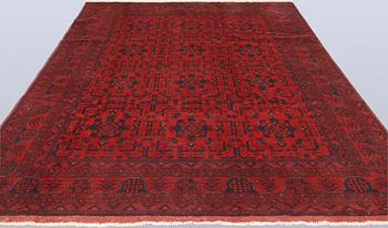 A Afghan fine carpet, 297 x 205 cm.